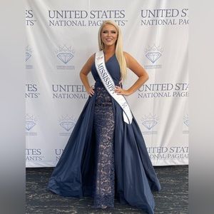 Size 2. Perfect condition. Detachable skirt. Never altered.